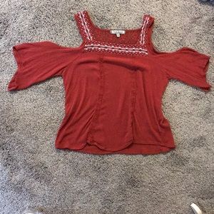 Super cute burnt orange cold shoulder top!